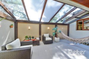 Casa em Condomínio à venda com 347m², 3 dormitórios, 1 suíte, 3 vagas, no bairro Jardim Isabel em Porto Alegre