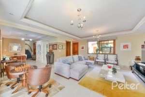 Casa em Condomínio à venda com 347m², 3 dormitórios, 1 suíte, 3 vagas, no bairro Jardim Isabel em Porto Alegre