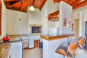 Casa em Condomínio à venda com 347m², 3 dormitórios, 1 suíte, 3 vagas, no bairro Jardim Isabel em Porto Alegre