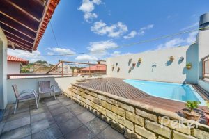 Casa em Condomínio à venda com 347m², 3 dormitórios, 1 suíte, 3 vagas, no bairro Jardim Isabel em Porto Alegre