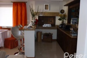 Casa em Condomínio à venda com 500m², 4 dormitórios, 4 suítes, 3 vagas, no bairro Vila Assunção em Porto Alegre