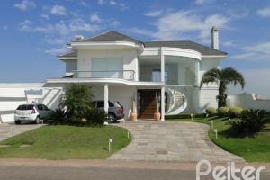 Casa em Condomínio à venda com 472m², 4 dormitórios, 3 suítes, 2 vagas, no bairro Terra Ville em PORTO ALEGRE