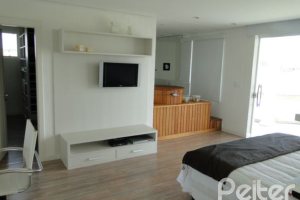 Casa em Condomínio à venda com 472m², 4 dormitórios, 3 suítes, 2 vagas, no bairro Terra Ville em PORTO ALEGRE