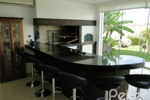 Casa em Condomínio à venda com 472m², 4 dormitórios, 3 suítes, 2 vagas, no bairro Terra Ville em PORTO ALEGRE