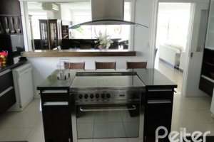 Casa em Condomínio à venda com 472m², 4 dormitórios, 3 suítes, 2 vagas, no bairro Terra Ville em PORTO ALEGRE