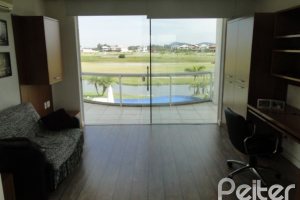 Casa em Condomínio à venda com 472m², 4 dormitórios, 3 suítes, 2 vagas, no bairro Terra Ville em PORTO ALEGRE