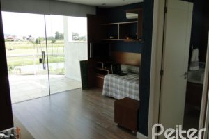 Casa em Condomínio à venda com 472m², 4 dormitórios, 3 suítes, 2 vagas, no bairro Terra Ville em PORTO ALEGRE