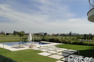 Casa em Condomínio à venda com 472m², 4 dormitórios, 3 suítes, 2 vagas, no bairro Terra Ville em PORTO ALEGRE