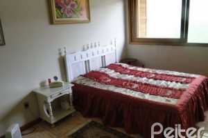 Casa à venda com 164m², 3 dormitórios, 2 suítes, 2 vagas, no bairro Espírito Santo em Porto Alegre