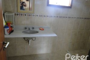 Casa à venda com 164m², 3 dormitórios, 2 suítes, 2 vagas, no bairro Espírito Santo em Porto Alegre