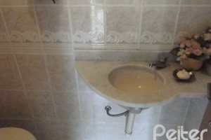 Casa à venda com 164m², 3 dormitórios, 2 suítes, 2 vagas, no bairro Espírito Santo em Porto Alegre