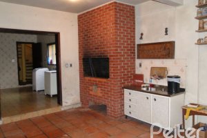 Casa à venda com 420m², 4 dormitórios, 1 suíte, 3 vagas, no bairro Vila Assunção em Porto Alegre