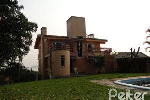 Casa à venda com 420m², 4 dormitórios, 1 suíte, 3 vagas, no bairro Vila Assunção em Porto Alegre