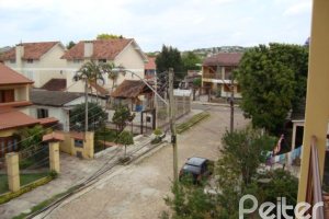 Casa em Condomínio à venda com 145m², 3 dormitórios, 1 suíte, 2 vagas, no bairro Nonoai em Porto Alegre