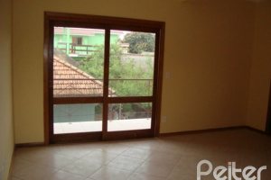 Casa em Condomínio à venda com 145m², 3 dormitórios, 1 suíte, 2 vagas, no bairro Nonoai em Porto Alegre