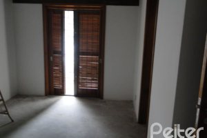 Casa à venda com 530m², 7 dormitórios, 5 suítes, 2 vagas, no bairro Jardim Isabel em Porto Alegre