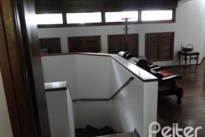 Casa à venda com 530m², 7 dormitórios, 5 suítes, 2 vagas, no bairro Jardim Isabel em Porto Alegre