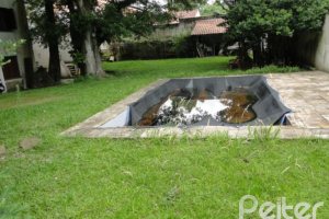 Casa à venda com 530m², 7 dormitórios, 5 suítes, 2 vagas, no bairro Jardim Isabel em Porto Alegre