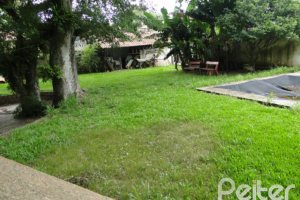 Casa à venda com 530m², 7 dormitórios, 5 suítes, 2 vagas, no bairro Jardim Isabel em Porto Alegre