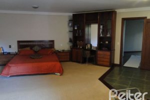 Casa em Condomínio à venda com 1350m², 7 dormitórios, 5 suítes, 4 vagas, no bairro Cavalhada em PORTO ALEGRE