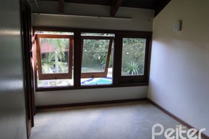 Casa em Condomínio à venda com 1350m², 7 dormitórios, 5 suítes, 4 vagas, no bairro Cavalhada em PORTO ALEGRE