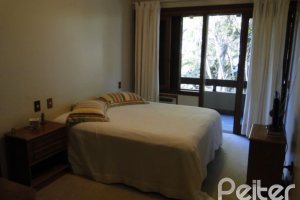 Casa em Condomínio à venda com 1350m², 7 dormitórios, 5 suítes, 4 vagas, no bairro Cavalhada em PORTO ALEGRE