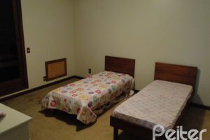 Casa em Condomínio à venda com 1350m², 7 dormitórios, 5 suítes, 4 vagas, no bairro Cavalhada em PORTO ALEGRE