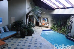 Casa em Condomínio à venda com 1350m², 7 dormitórios, 5 suítes, 4 vagas, no bairro Cavalhada em PORTO ALEGRE