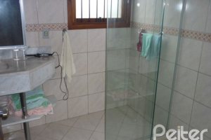 Casa à venda com 580m², 4 dormitórios, 4 suítes, 2 vagas, no bairro Jardim Isabel em Porto Alegre