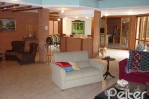 Casa à venda com 580m², 4 dormitórios, 4 suítes, 2 vagas, no bairro Jardim Isabel em Porto Alegre