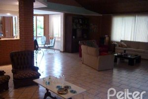 Casa à venda com 580m², 4 dormitórios, 4 suítes, 2 vagas, no bairro Jardim Isabel em Porto Alegre