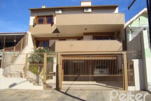 Casa à venda com 520m², 4 dormitórios, 1 suíte, 3 vagas, no bairro Tristeza em Porto Alegre