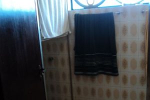 Casa à venda com 345m², 3 dormitórios, 1 suíte, 3 vagas, no bairro Guarujá em Porto Alegre