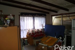 Casa à venda com 280m², 3 dormitórios, 1 suíte, 2 vagas, no bairro Tristeza em Porto Alegre