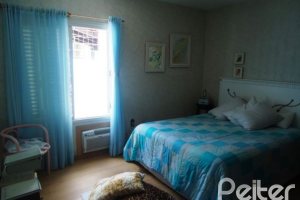 Casa à venda com 181m², 3 dormitórios, 1 suíte, 4 vagas, no bairro Ipanema em Porto Alegre