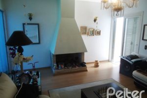 Casa à venda com 181m², 3 dormitórios, 1 suíte, 4 vagas, no bairro Ipanema em Porto Alegre