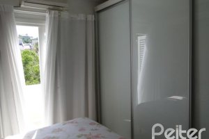 Casa à venda com 219m², 3 dormitórios, 1 suíte, 3 vagas, no bairro Jardim Isabel em Porto Alegre