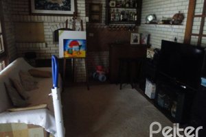 Casa à venda com 386m², 3 dormitórios, 1 suíte, 3 vagas, no bairro Tristeza em Porto Alegre