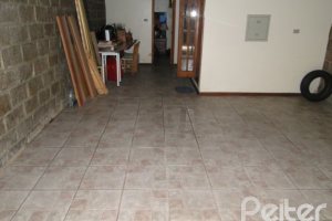 Casa à venda com 386m², 3 dormitórios, 1 suíte, 3 vagas, no bairro Tristeza em Porto Alegre