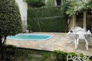 Casa à venda com 386m², 3 dormitórios, 1 suíte, 3 vagas, no bairro Tristeza em Porto Alegre