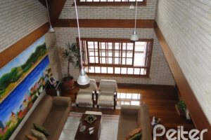 Casa à venda com 386m², 3 dormitórios, 1 suíte, 3 vagas, no bairro Tristeza em Porto Alegre