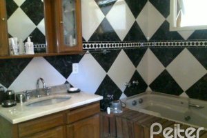 Casa à venda com 219m², 3 dormitórios, 1 suíte, 3 vagas, no bairro Tristeza em Porto Alegre